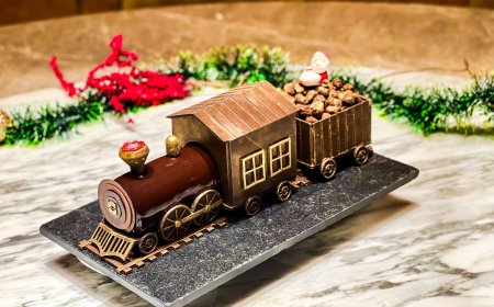 A Limited-Edition Christmas Masterpiece: Hazelnut & Passion Yule Log Train by Shangri-La Colombo
