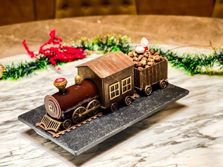 A Limited-Edition Christmas Masterpiece: Hazelnut & Passion Yule Log Train by Shangri-La Colombo